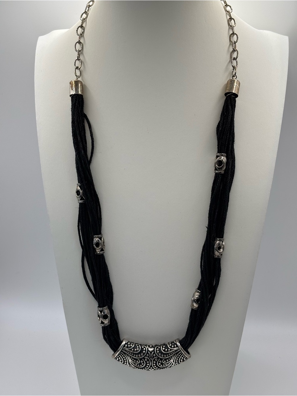 Black Multi-Strand Necklace with Ornate Silver-Tone Accent